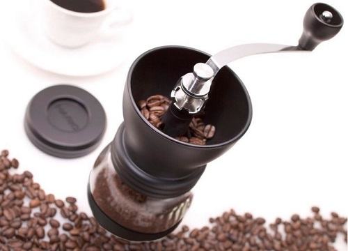 Basic Burr Grinder with Coffee Beans Next to it