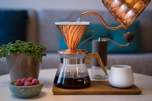 Pouring Water into Pour Over Coffee System