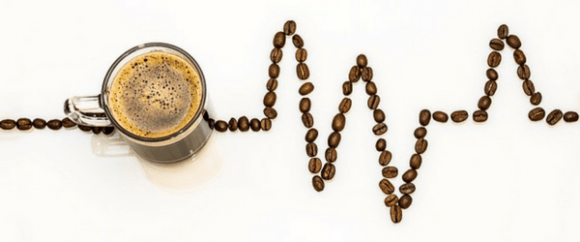 Cup Of Coffee With Coffee Beans