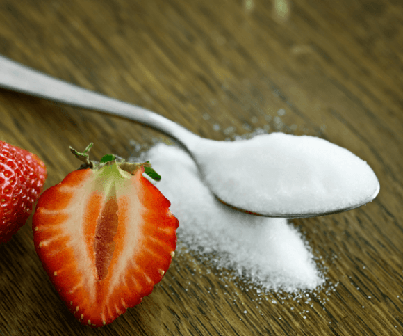 Sugar And Strawberries On A Table