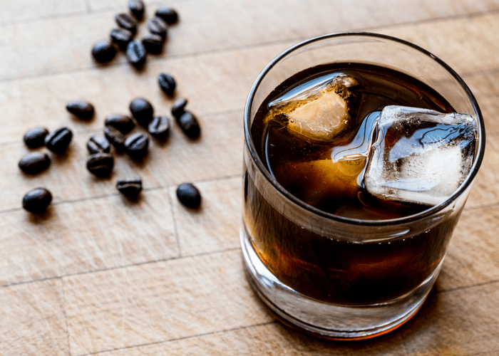 Espresso Tonic On Counter With Coffee Beans