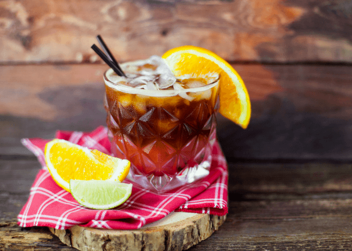 Espresso Tonic With Oranges On Wooden Background