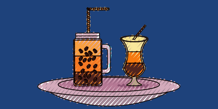 Two Drinks With Coffee Ice Cubes On Blue Background