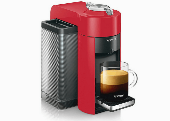 Nespresso Vertuo Evoluo Machine With Cup Of Coffee