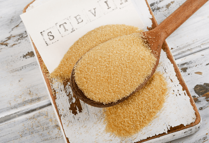 Cane sugar mixed with stevia on a worn wood background