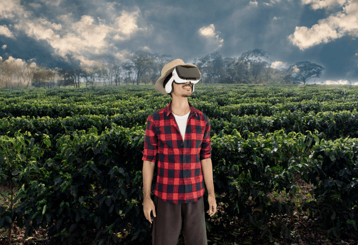 Young man viewing coffee plantation with virtual reality glasses