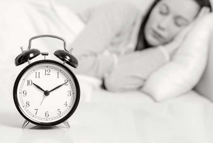 Woman sleeping who avoided caffeine before bed