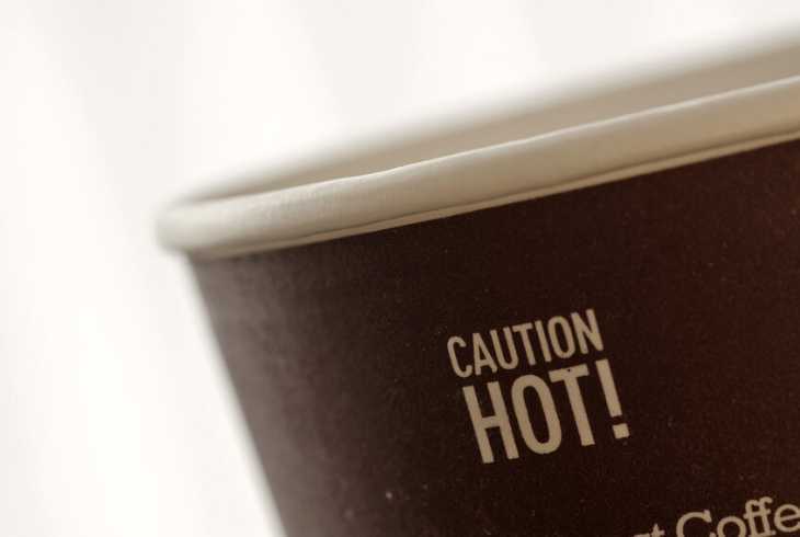 Caution sign on hot coffee