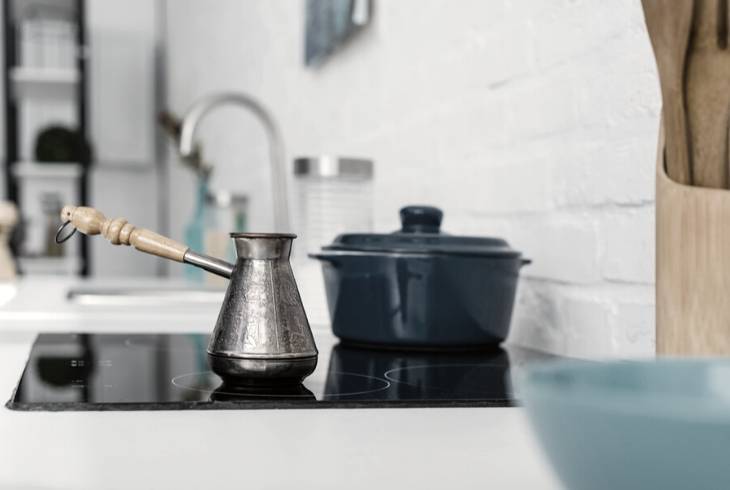 Turkish coffee brewing on stovetop